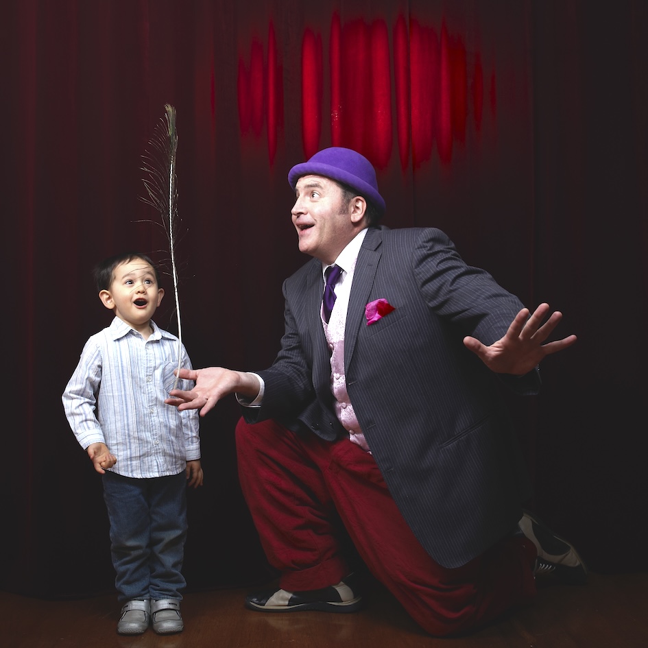 Guy sharing a moment of wonder with a child